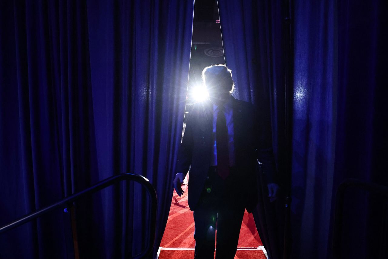 Donald Trump walks off stage after speaking, during an election night event in West Palm Beach, Florida, on November 06, 2024.