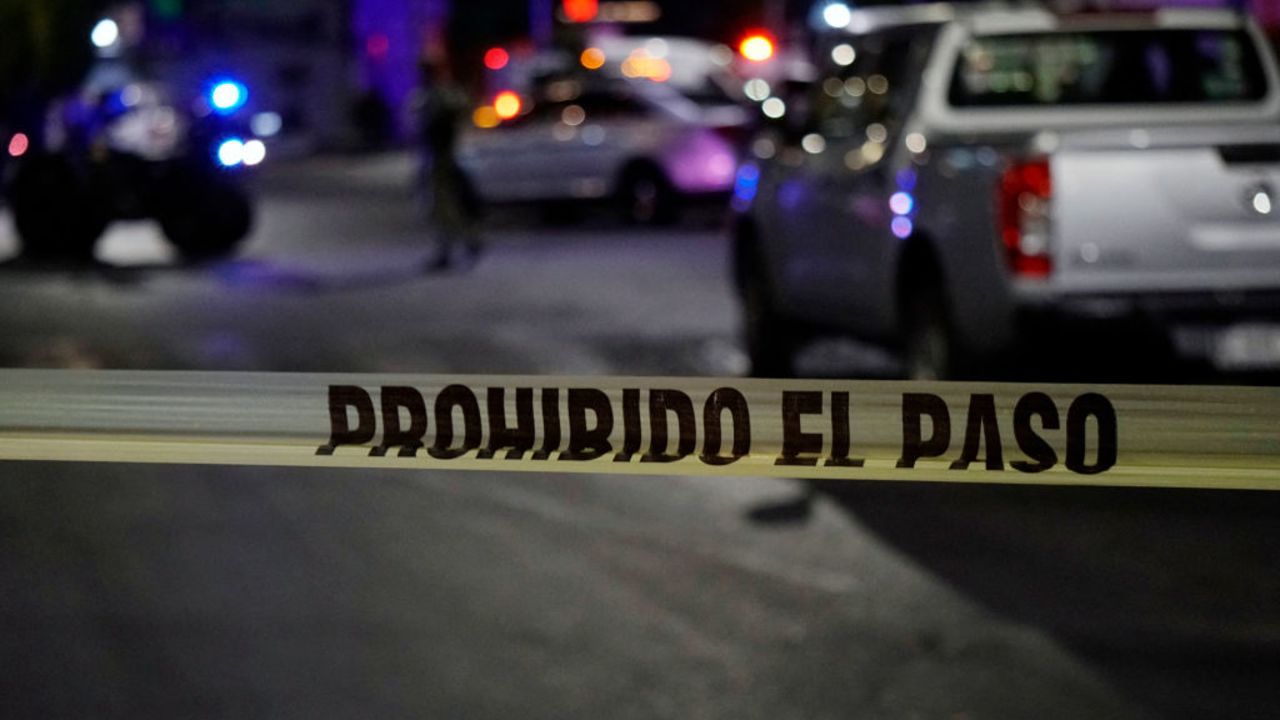 View of a tape to prevent access to the area outside the Los Cantaritos bar where an armed group broke in on the eve killing ten people and leaving at least seven more injured, in the city of Queretaro, state of Queretaro, Mexico, on November 10, 2024. (Photo by MARIO ARMAS / AFP) (Photo by MARIO ARMAS/AFP via Getty Images)