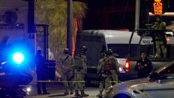 TOPSHOT - Mexican Army soldiers and public security agents stand guard outside the Los Cantaritos bar where an armed group broke in on the eve, killing ten people and leaving at least seven more injured, in the city of Queretaro, state of Queretaro, Mexico, on November 10, 2024. (Photo by MARIO ARMAS / AFP) (Photo by MARIO ARMAS/AFP via Getty Images)