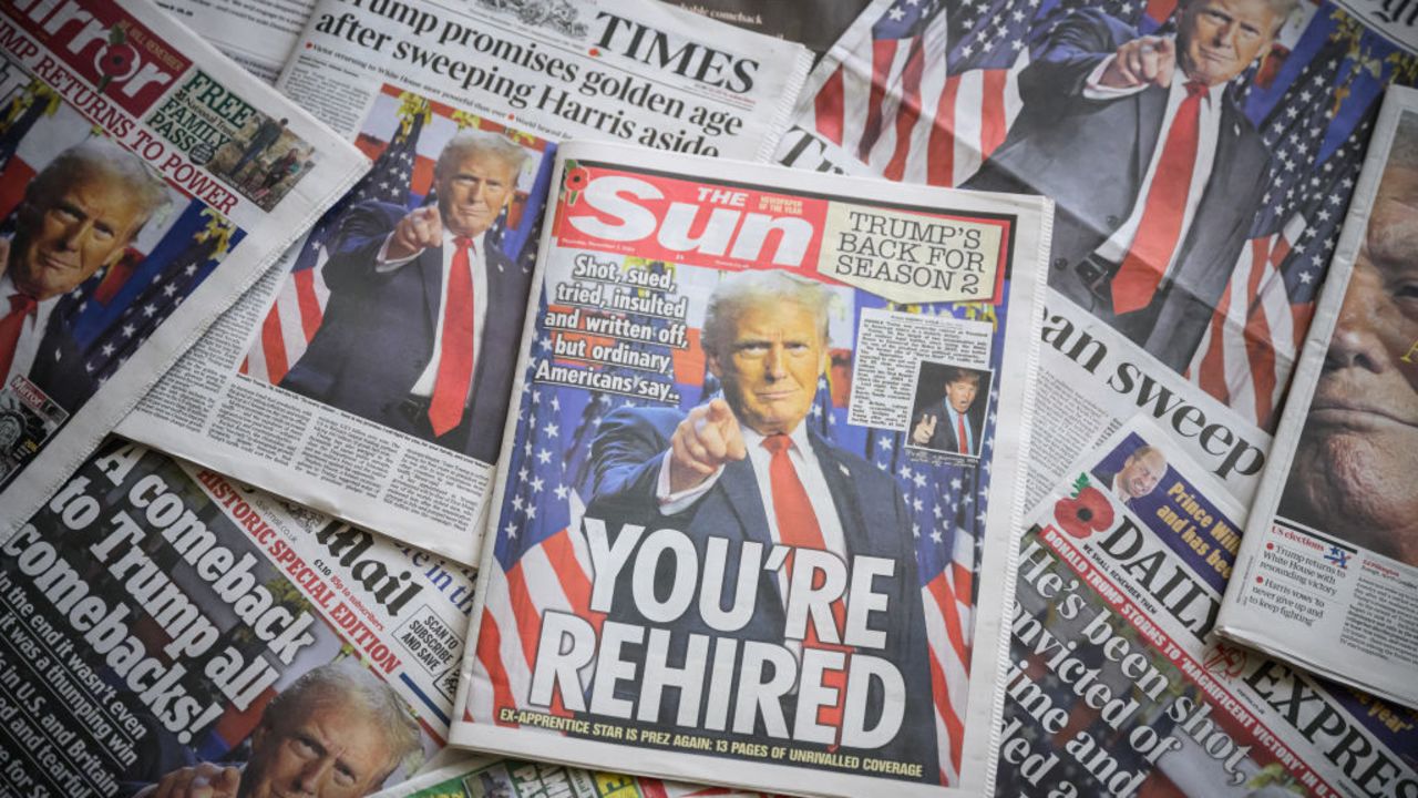 LONDON, ENGLAND - NOVEMBER 07: In this photo illustration, UK newspaper front pages display stories on the re-election of former US President Donald Trump on November 07, 2024 in London, England. Republican Donald Trump has won a second term to become the 47th President of the United States of America, beating Democrat Kamala Harris. (Photo illustration by Leon Neal/Getty Images)