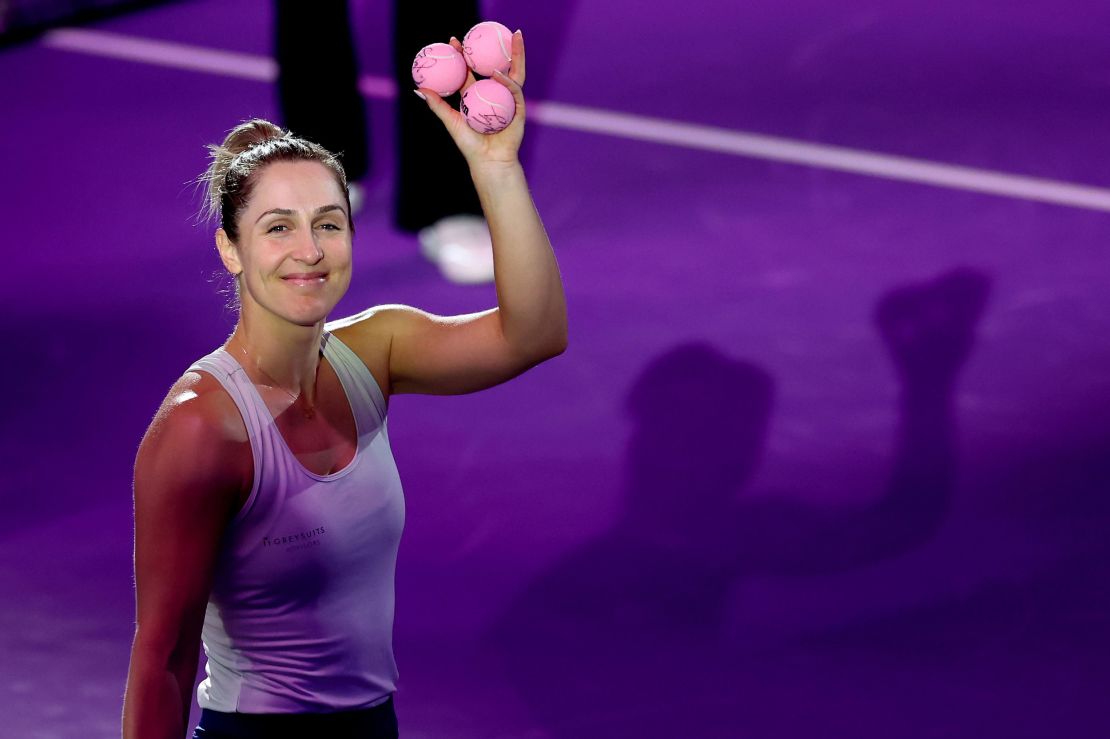 Dabrowski hits pink signed tennis balls for breast cancer awareness into the crowd with doubles partner Erin Routliffe (not pictured) after their victory against Caroline Dolehide and Desirae Krawczyk in their round robin doubles match during Day 6 of the 2024 WTA Finals on November 7 in Riyadh, Saudi Arabia.