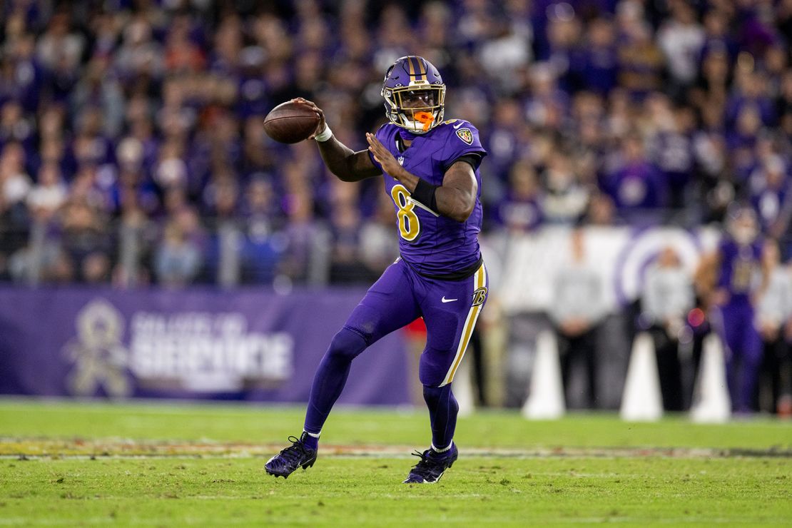 Ravens quarterback Lamar Jackson looking to make a throw against the Bengals.