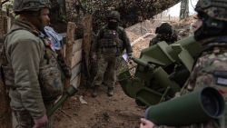 TORETSK, UKRAINE - NOVEMBER 09: Members of the unit Dnipro One of the Joint Assault Brigade of the National Police of Ukraine "Luty" operate a Soviet-era howitzer D-30 on November 09, 2024, near Toretsk, Ukraine. Ukraine has been fending off Russian forces from the outskirts of this town in Ukraine's eastern Donetsk Region. (Photo by Diego Fedele/Getty Images)