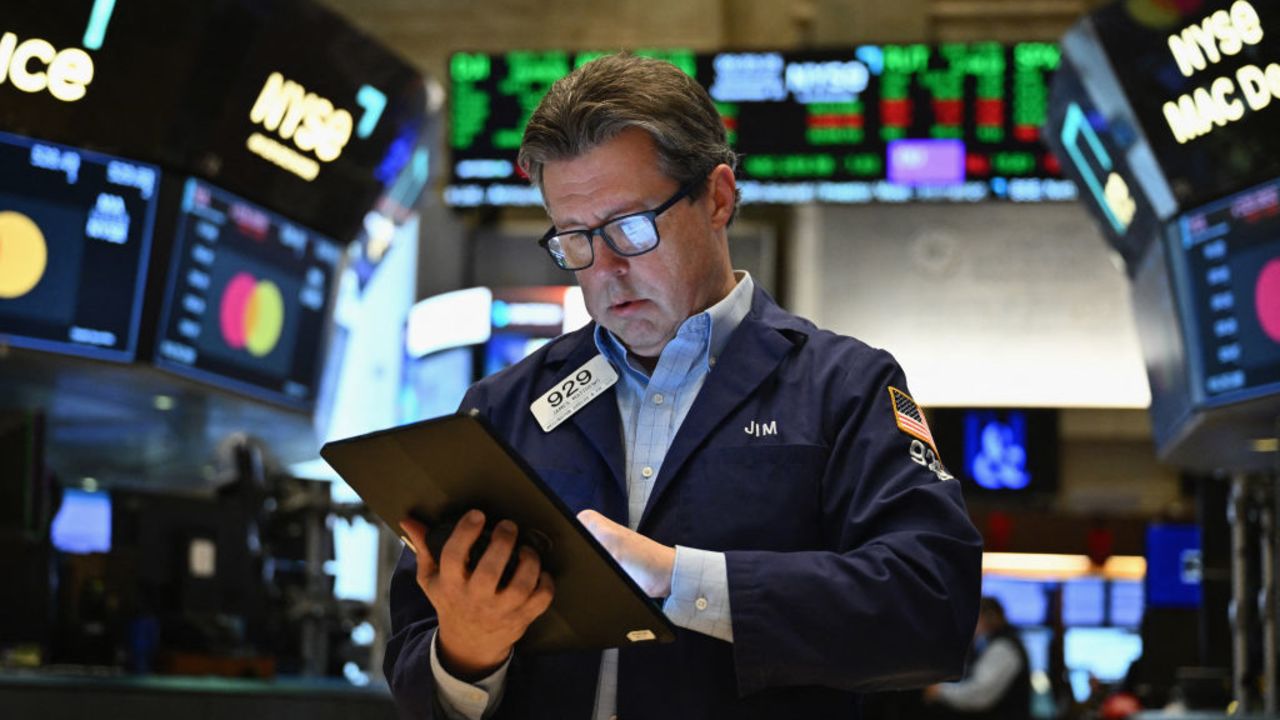 Traders work on the floor of the New York Stock Exchange (NYSE) at the opening bell on November 13, 2024, in New York City. (Photo by ANGELA WEISS / AFP) (Photo by ANGELA WEISS/AFP via Getty Images)