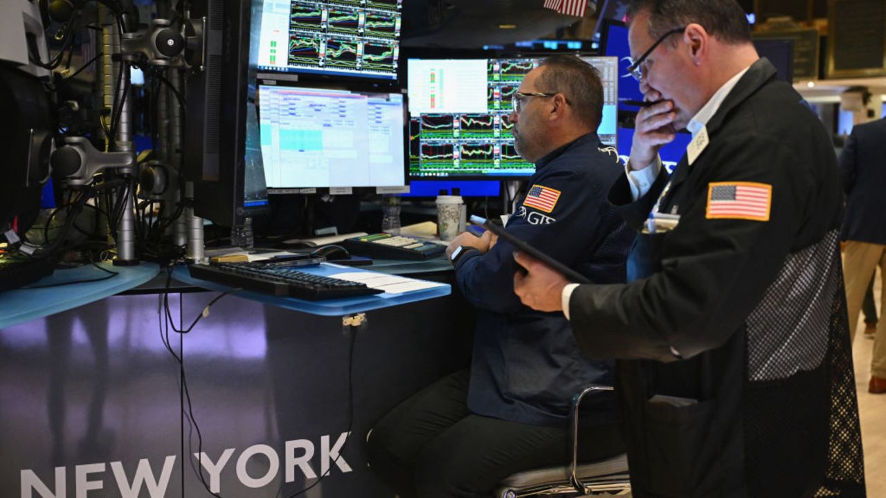 Traders work on the floor of the New York Stock Exchange (NYSE) at the opening bell on November 13, 2024, in New York City. (Photo by ANGELA WEISS / AFP) (Photo by ANGELA WEISS/AFP via Getty Images)