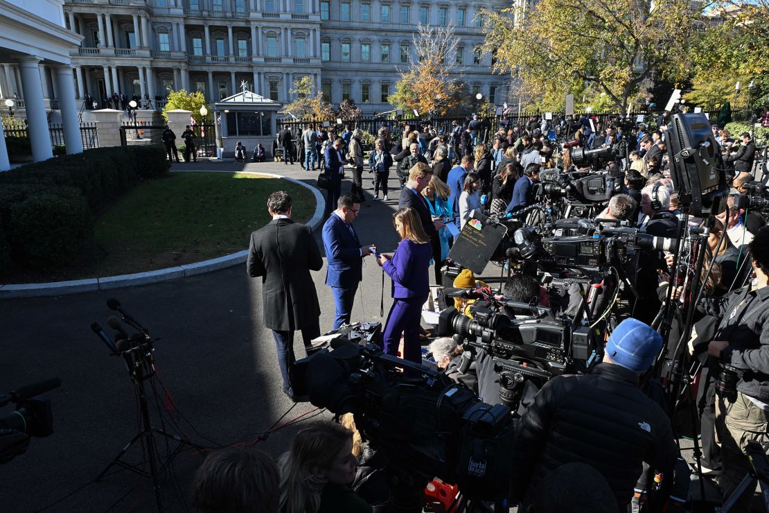 Journalists gather outside the White House as President Joe Biden and President-elect Donald hold a meeting on November 13, 2024.