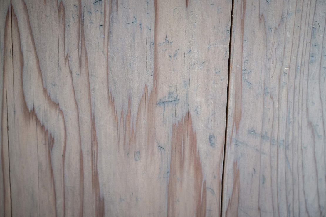 A closeup image of scratches on a torii gate at Meiji Shrine, taken on November 14, 2024.