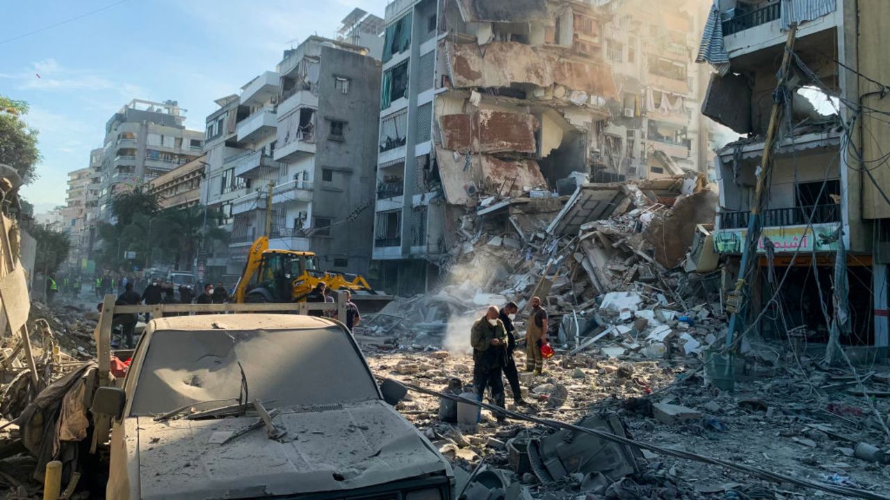 People inspect the destruction following an Israeli airstrike targeting the Ghobeiri neighborhood in southern Beirut on November 14, 2024, amid the ongoing war between Israel and Hezbollah. (Photo by AFP) (Photo by -/AFP via Getty Images)