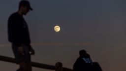 The November full moon nicknamed the Beaver Moon shines overhead the Mulholland Scenic Overlook in Los Angeles Thursday, Nov. 14, 2024. (Allen J. Schaben / Los Angeles Times via Getty Images)