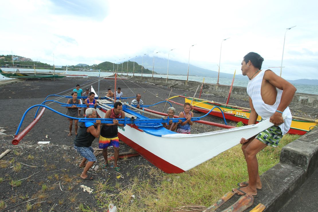 Hundreds of thousands of people were evacuated from their homes as others made preparations for the typhoon ahead of its landfall on Saturday.