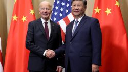 US President Joe Biden (L) shakes hands with Chinese President Xi Jinping on the sidelines of the Asia-Pacific Economic Cooperation (APEC) summit in Lima, Peru, November 16, 2024. (Photo by Leah Millis / POOL / AFP) (Photo by LEAH MILLIS/POOL/AFP via Getty Images)