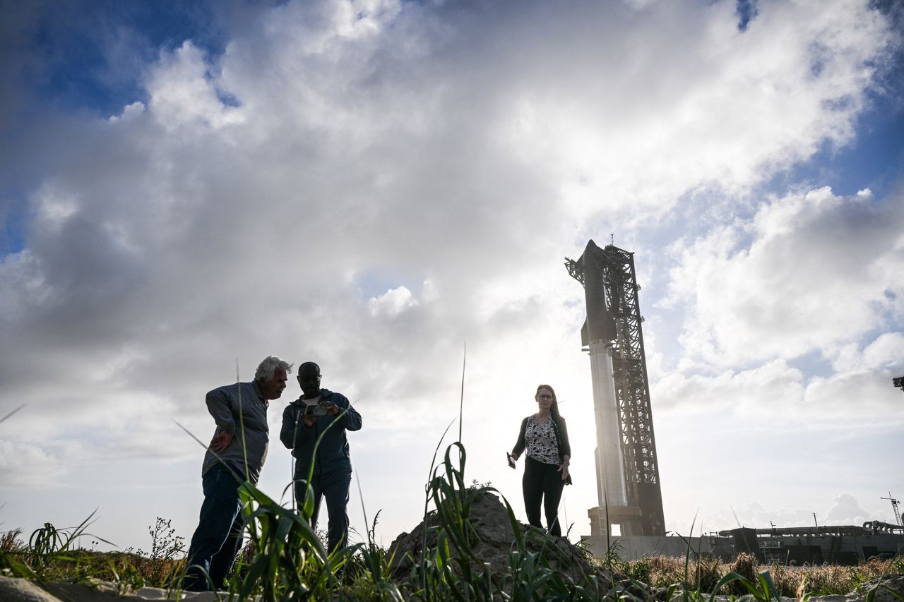 People take photos of the SpaceX Starship  in Brownsville, Texas, on November 17.