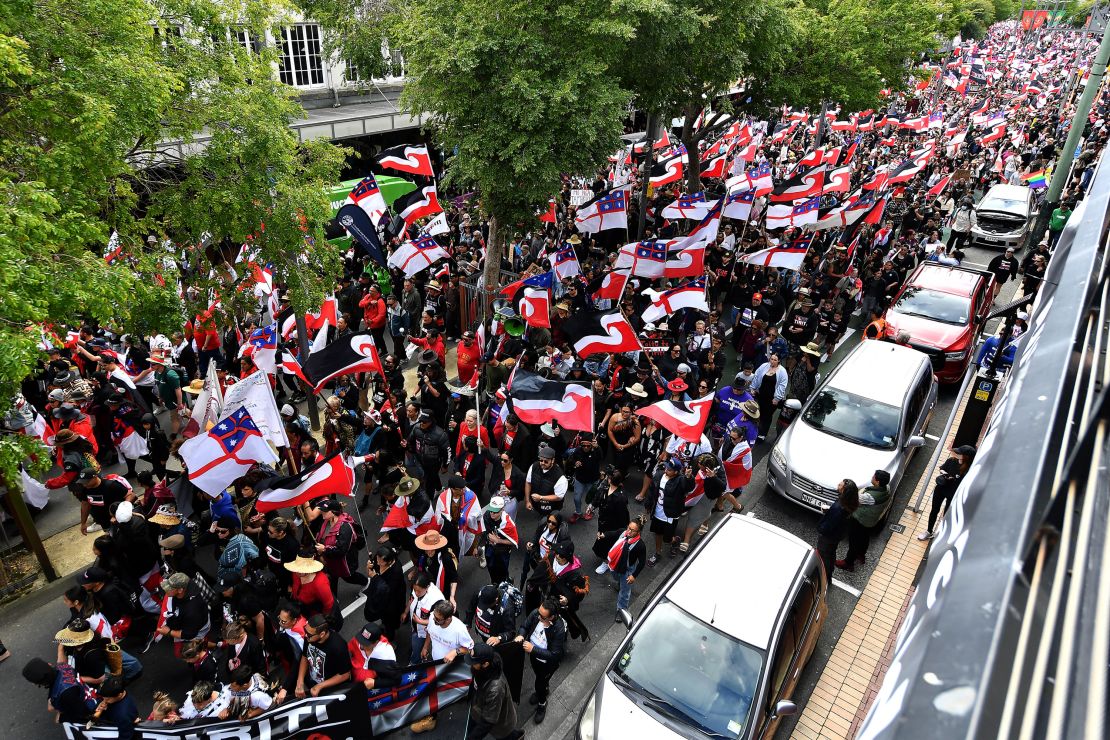 Members of the Maori community and their supporters march through the streets in a protest rally to criticise the government for its policies affecting the Indigenous Mori population in Wellington on November 19, 2024.