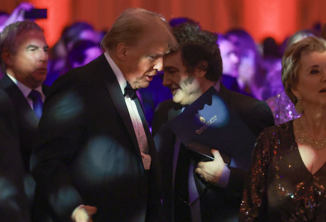 Argentine President Javier Milei walks with the president-elect of the United States, Donald Trump, while attending the Gala of America First Policy Institute held in Mar-A-Lago on November 14, 2024 in Palm Beach, Florida.