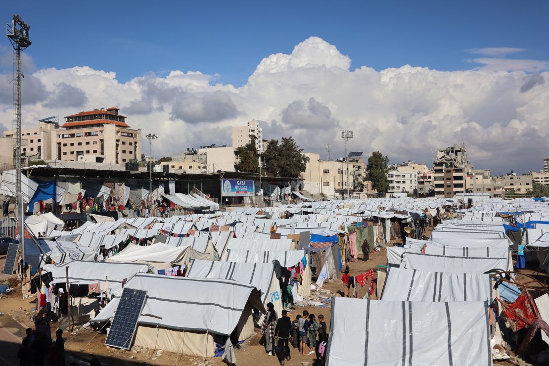 Tents protecting evacuated Palestinians can be found at Yarmuk Stadium in Gaza.