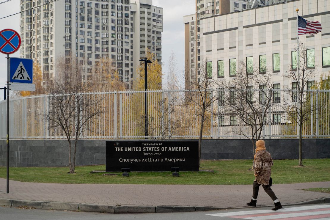 A woman walks past the temporarily shuttered US Embassy in Kyiv on November 20, 2024.