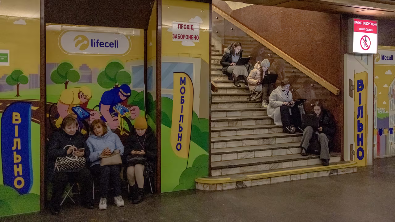Local residents take shelter in a metro station during an air strike alarm in Kyiv, Ukraine, on November 20.