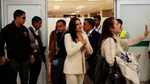 Ecuador's Vice-President Veronica Abad acknowledges ers upon her arrival at Mariscal Sucre International Airport in Quito on November 20, 2024. Abad returned from Turkey, where she was transferred in September for security reasons while serving as Ecuador's ambassador to Israel, when the Middle East conflict escalated. Ecuador's government suspended vice-president Veronica Abad for five months for alleged 'unjustified abandonment' of her duties, according to an istrative summary issued by the labour ministry on November 9. (Photo by Galo Paguay / AFP) (Photo by GALO PAGUAY/AFP via Getty Images)