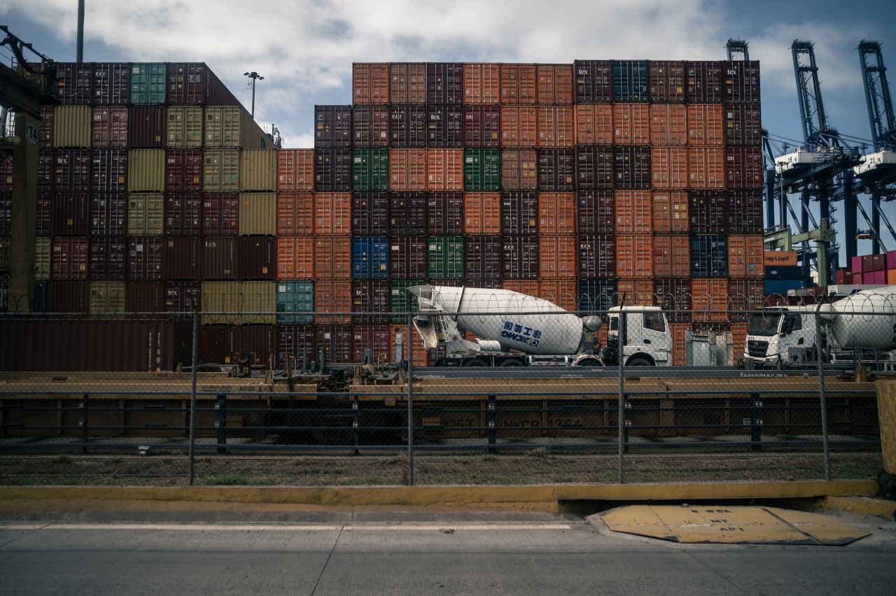 Shipping containers are stacked at the Port of Manzanillo in Manzanillo, Mexico, on Tuesday, November 19.