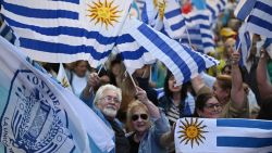 Supporters of Uruguay's presidential candidate for the Republican Coalition, Alvaro Delgado, attend his campaign closing rally in Montevideo on November 20, 2024. Alvaro Delgado of outgoing President Luis Lacalle Pou's ruling coalition and Yamandu Orsi of the left-wing Frente Amplio party will go head-to-head in the November 24 election run-off. (Photo by Eitan ABRAMOVICH / AFP) (Photo by EITAN ABRAMOVICH/AFP via Getty Images)