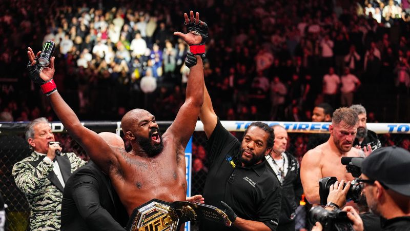 Jon Jones retains UFC heavyweight title with spinning kick to stop Stipe Miocic and celebrates with President-elect Donald Trump