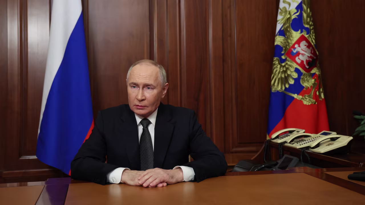 In this pool photograph distributed by the Russian state agency Sputnik, Russia's President Vladimir Putin delivers a televised address to the nation at the Kremlin in Moscow on November 21, 2024. Russian President Vladimir Putin said on November 21, 2024 that the country's forces had hit Ukraine with a new mid-range ballistic missile. (Photo by Vyacheslav PROKOFYEV / POOL / AFP) (Photo by VYACHESLAV PROKOFYEV/POOL/AFP via Getty Images)