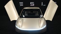 Tesla's Cybercab robotaxi is displayed during the AutoMobility LA 2024 auto show at the Los Angeles Convention Center in Los Angeles, November 21, 2024.
