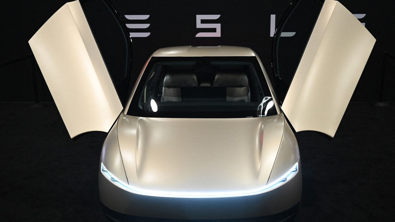 Tesla's Cybercab robotaxi is displayed during the AutoMobility LA 2024 auto show at the Los Angeles Convention Center in Los Angeles, November 21, 2024.