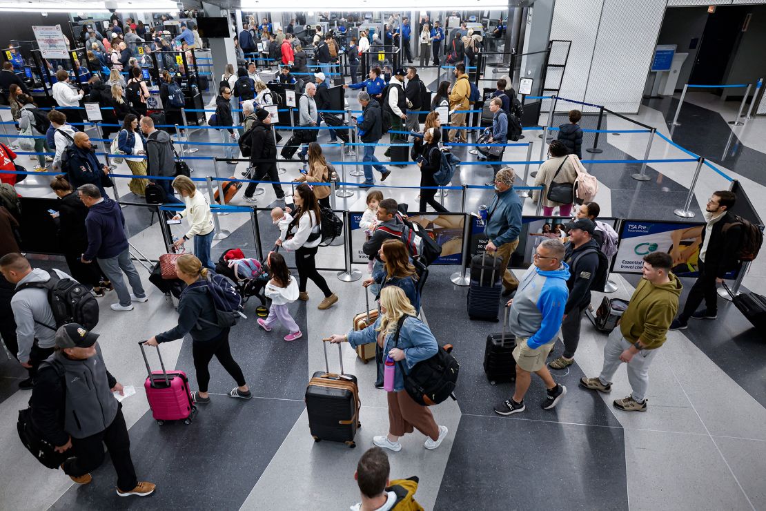 TSA security checkpoints, such as this one pictured at Chicago's O'Hare International Airport in November, are designed to carefully screen passengers. Yet there are a small number of cases reported of unticketed passengers slipping through.