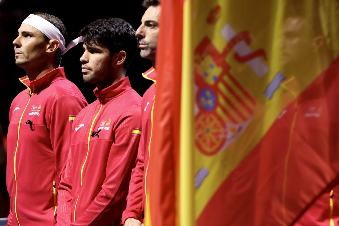 Nadal and Carlos Alcaraz of Spain line up for the national anthems ahead of Tuesday's Davis Cup quarterfinal.