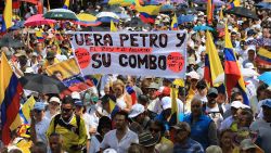 Demonstrators march during a protest against Colombian President Gustavo Petro's government over health and pension reforms in Medellin on November 23, 2024. (Photo by JAIME SALDARRIAGA / AFP) (Photo by JAIME SALDARRIAGA/AFP via Getty Images)