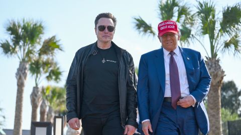 BROWNSVILLE, TEXAS - NOVEMBER 19: U.S. President-elect Donald Trump greets Elon Musk as he arrives to attend a viewing of the launch of the sixth test flight of the SpaceX Starship rocket on November 19, 2024 in Brownsville, Texas. SpaceX’s billionaire owner, Elon Musk, a Trump confidante, has been tapped to lead the new Department of Government Efficiency alongside former presidential candidate Vivek Ramaswamy. (Photo by Brandon Bell/Getty Images)