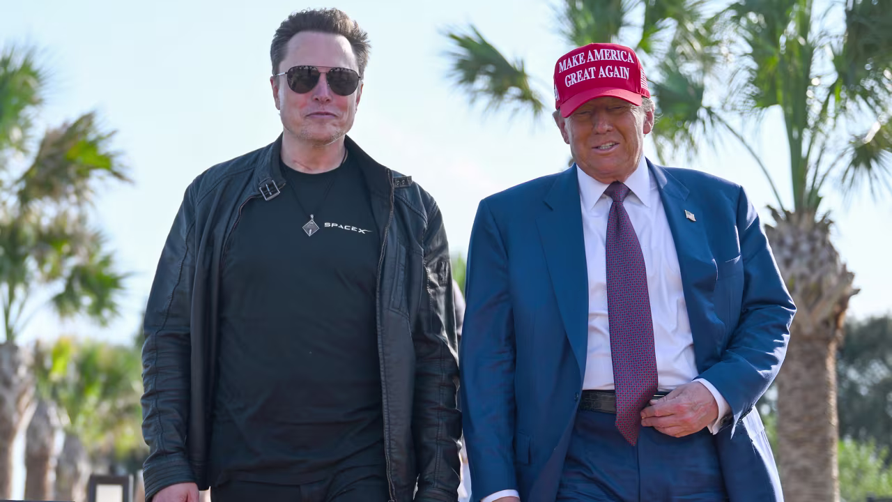 President-elect Donald Trump walks with Elon Musk as he arrives to attend a viewing of the launch of the sixth test flight of the SpaceX Starship rocket in Brownsville, Texas, on November 19.