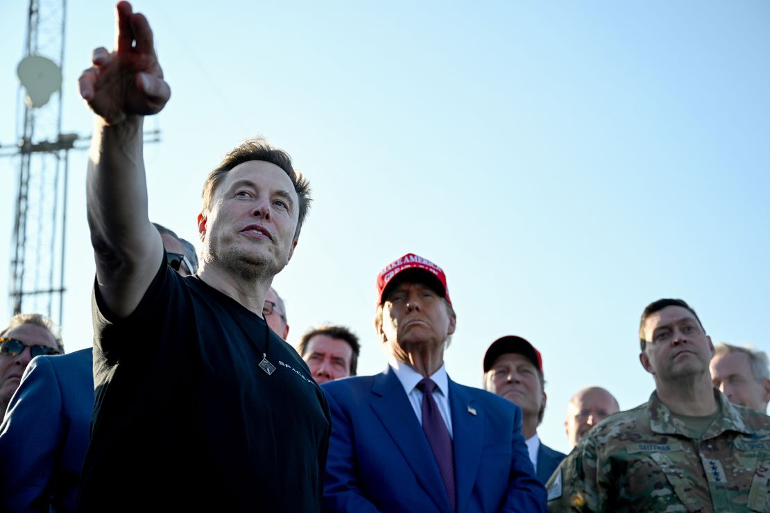 Elon Musk speaks with US President-elect Donald Trump and guests at a viewing of the launch of the sixth test flight of the SpaceX Starship rocket on November 19, 2024.