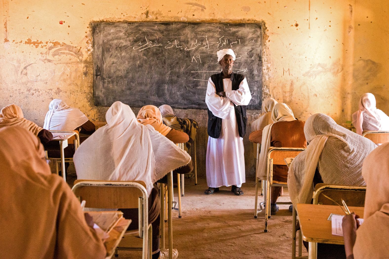 TOPSHOT - A teacher invigilates middle school students during their end-of-year exams in the northern Sudanese village of Usli on November 24, 2024. (Photo by AFP) (Photo by -/AFP via Getty Images)