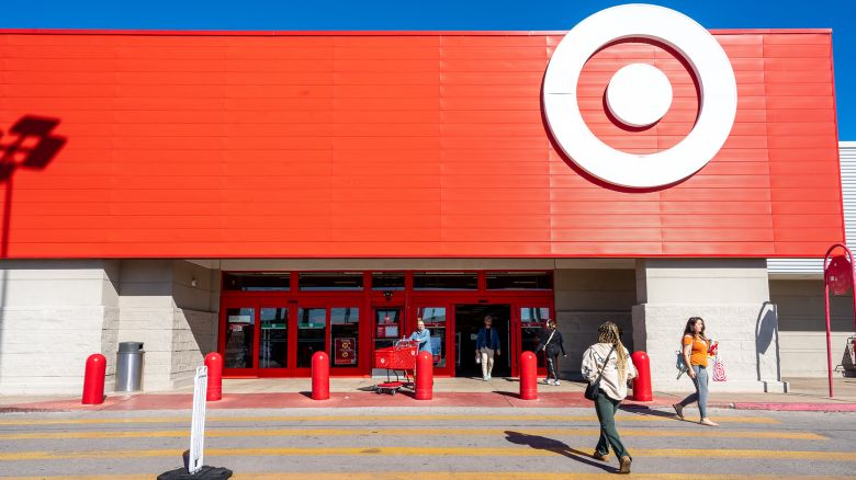 Customers enter and exit a Target store on November 20, 2024 in Austin, Texas.