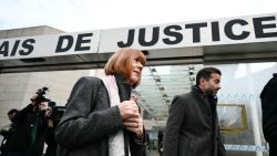 Gisele Pelicot looks on (C) next to her lawyer Antoine Camus (R) as she leaves the Avignon courthouse during the trial of her former partner Dominique Pelicot accused of drugging her for nearly ten years and inviting strangers to rape her at their home in Mazan, a small town in the south of France, in Avignon, on November 25, 2024. French prosectors said on November 25, 2024, they were seeking the maximum 20-year jail term for the man charged with enlisting dozens of strangers to rape his heavily-sedated wife, in a trial that has shaken France. (Photo by Christophe SIMON / AFP) (Photo by CHRISTOPHE SIMON/AFP via Getty Images)