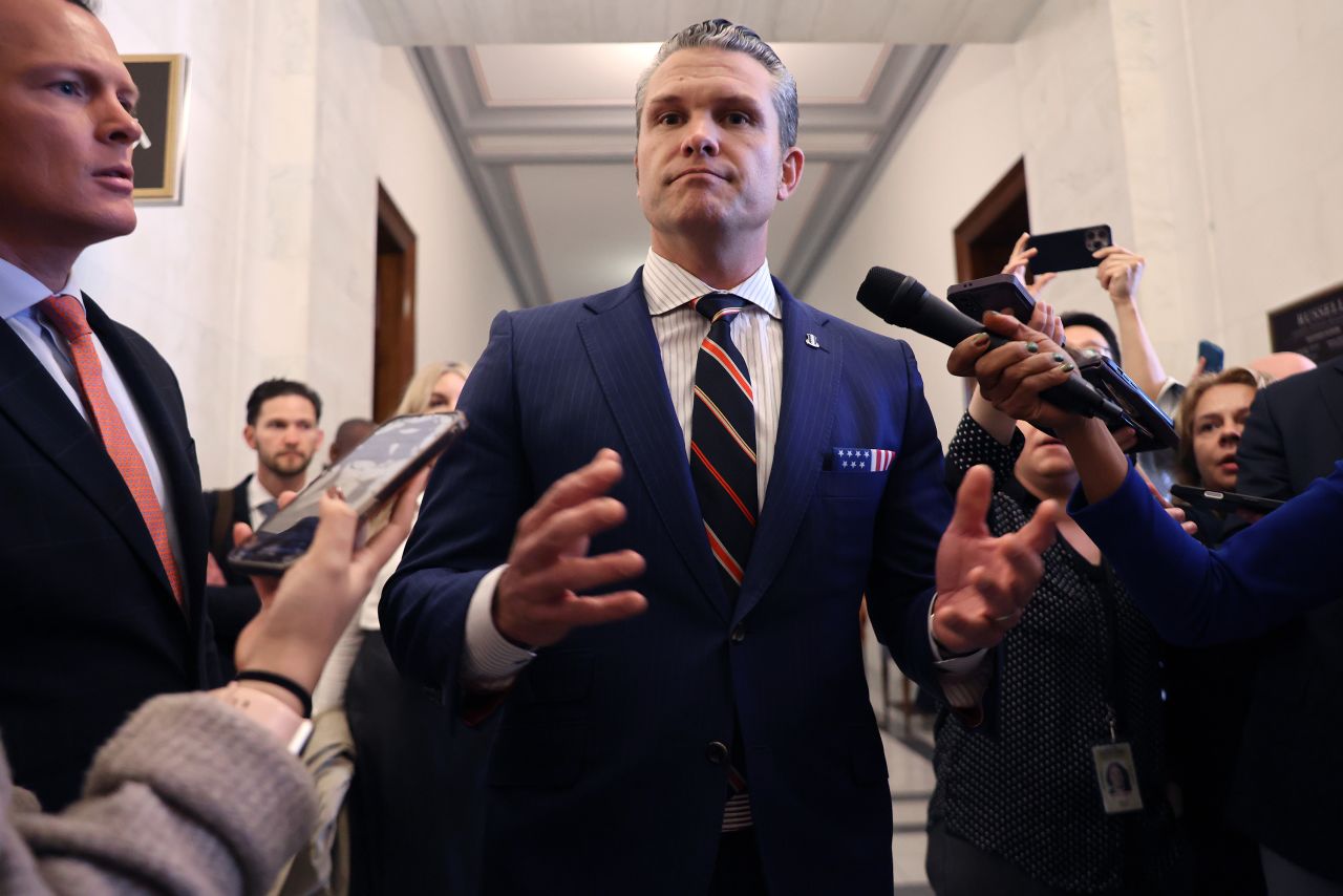 Pete Hegseth talks to reporters after a series of meetings with senators in the Russell Senate Office Building on Capitol Hill on November 21.
