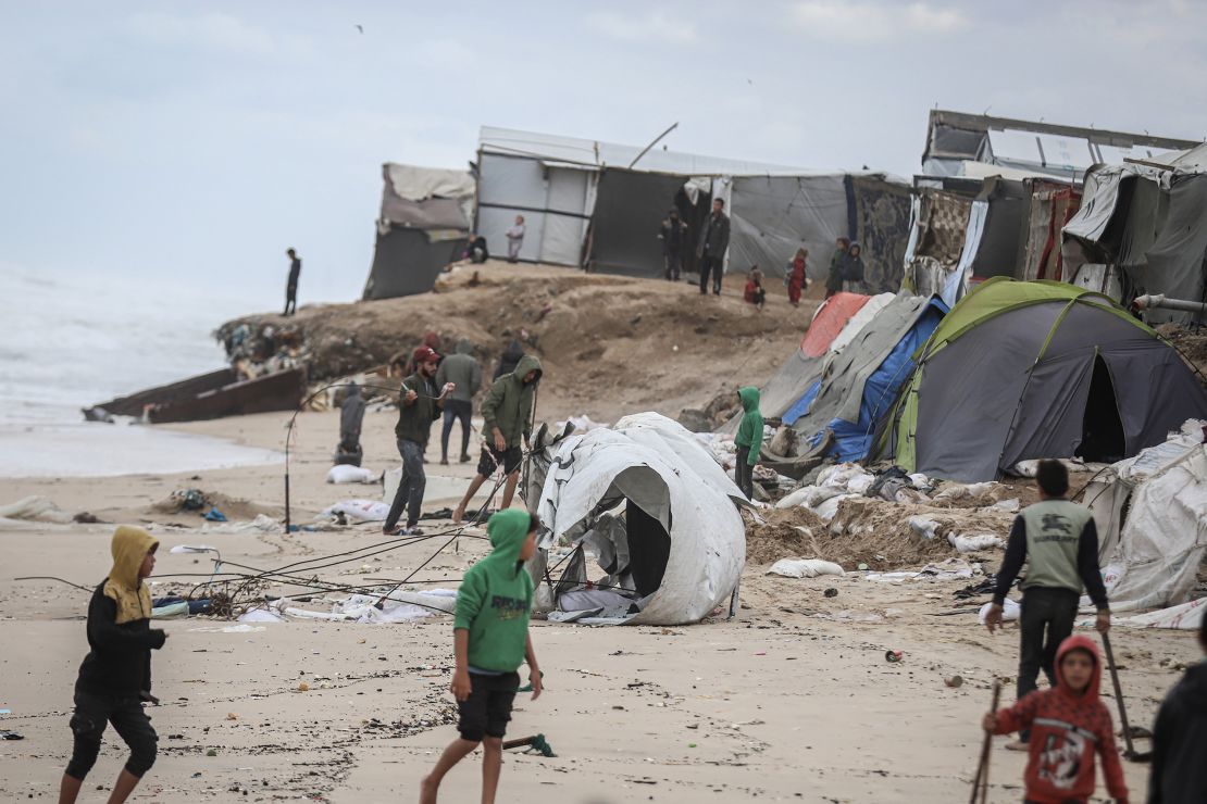 Damaged temporary shelters for displaced Palestinians after bad weather on a beach near Deir al-Balah, central Gaza, on Monday, Nov. 25, 2024. The United Nations says there's a humanitarian crisis in Gaza, adding that aid organizations are struggling to provide enough assistance. Photographer: Ahmad Salem/Bloomberg via Getty Images