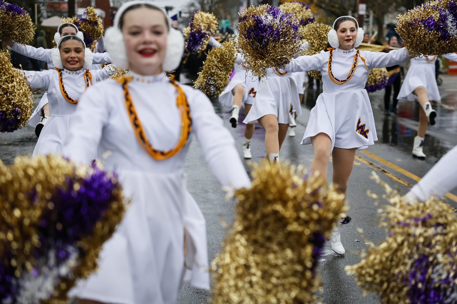 Dancers from Amsterdam High School perform in a Thanksgiving parade in Plymouth, Massachusetts, on Saturday.