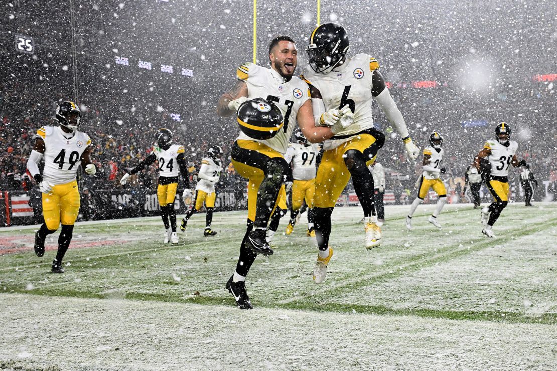 Pittsburgh Steelers players Nick Herbig and Patrick Queen celebrate a fumble against the Cleveland Browns in the fourth quarter.