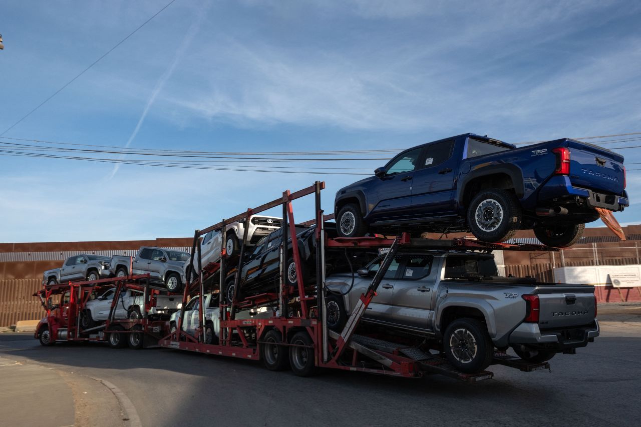 A truck loaded with pickups drives to cross to the US at the Otay commercial crossing port in Tijuana, Baja California state, Mexico.