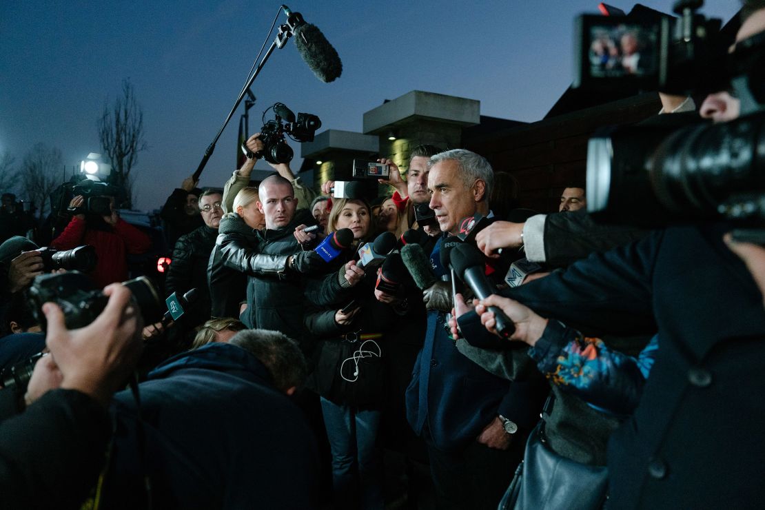 Romanian presidential candidate Calin Georgescu gives a statement to media in the village of Izvorani, on the outskirts of Bucharest, on November 26.