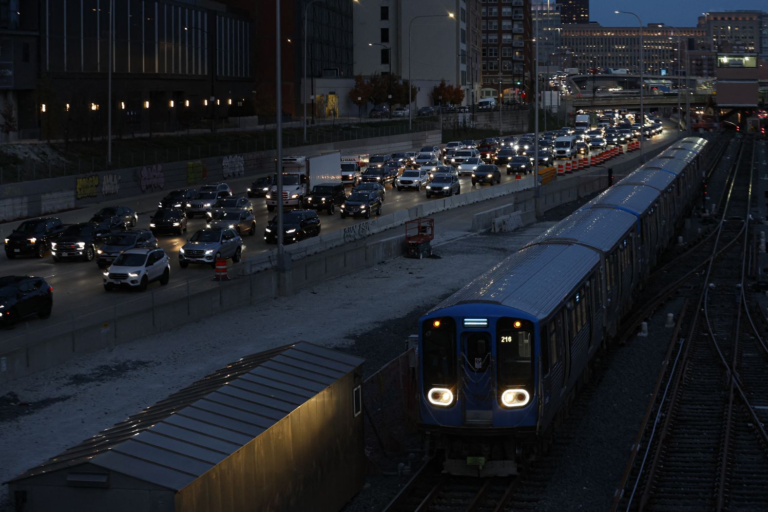 Heavy traffic moves along a freeway in Chicago as travelers hit the road Tuesday ahead of the Thanksgiving holiday.