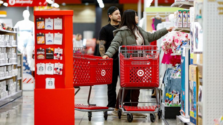 Shoppers look for bargains at a Target store in Chicago on November 26, 2024, ahead of the Black Friday shopping day. (Photo by KAMIL KRZACZYNSKI / AFP) (Photo by KAMIL KRZACZYNSKI/AFP via Getty Images)