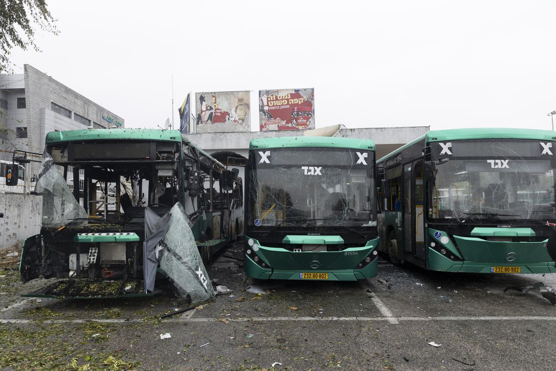 Damaged buses are seen after a rocket fired from Lebanon struck the main bus station overnight on Wednesday in Kiryat Shmona, Israel.