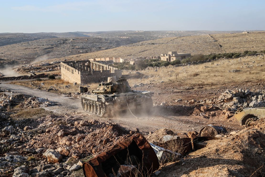 ALEPPO, SYRIA - NOVEMBER 27: Clashes erupt between the Bashar al-Assad regime and the opposition armed group Hayat Tahrir al-Sham (HTS) in the rural areas of Aleppo province in northern Syria on November 27, 2024. The opposition armed groups have advanced to within 8 kilometers of the center of Aleppo city, and intense clashes are reported to be ongoing. Meanwhile, the Assad regime targeted civilian settlements with ground-to-ground weaponry during the ongoing clashes. (Photo by Izzettin Kasim/Anadolu via Getty Images)