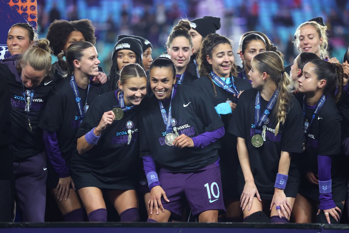 Marta, who many considered the greatest woman footballer of all time, celebrates the title win with her Pride teammates.