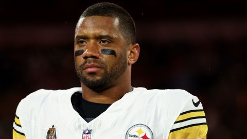 Russell Wilson of the Pittsburgh Steelers stands on the sidelines during the national anthem prior to a game against the Cleveland Browns at Huntington Bank Field on November 21, 2024, in Cleveland, Ohio.