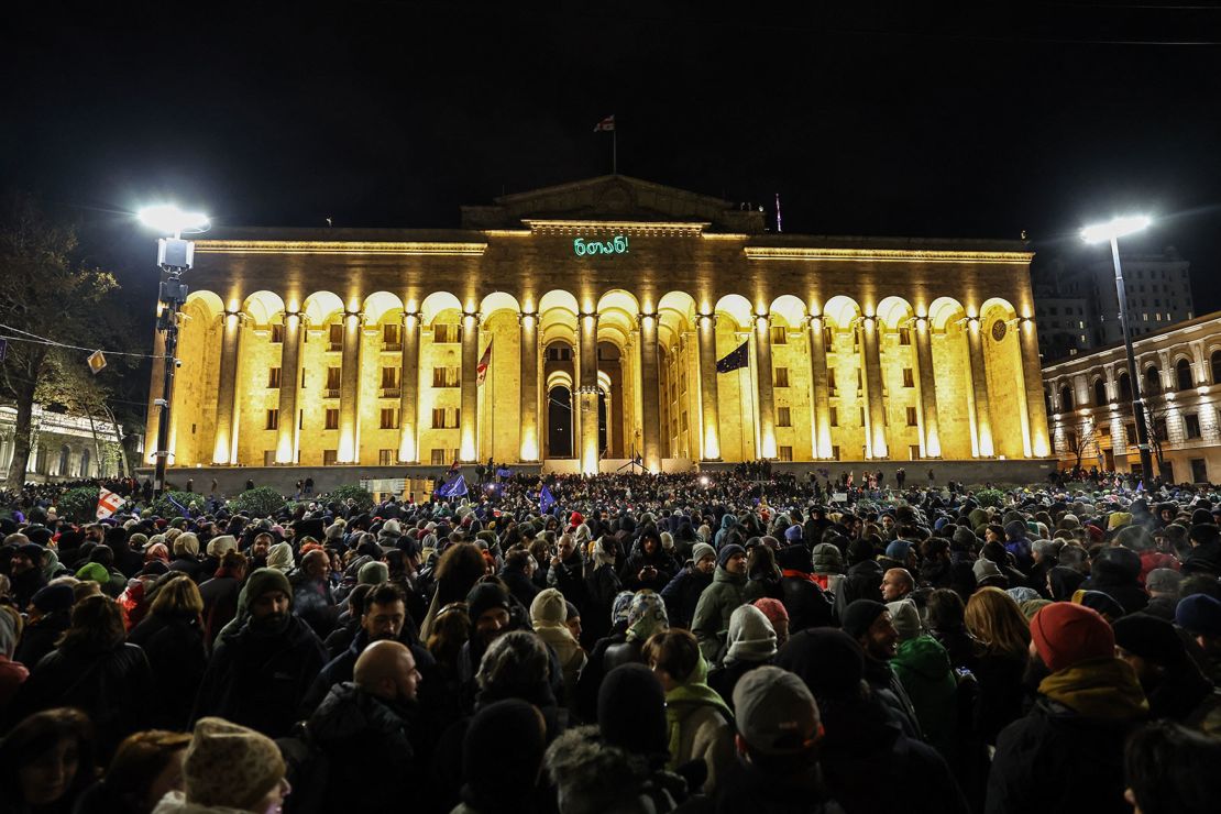 Protesters gather in front of Gerogia's parliament in Tbilisi on November 28, 2024.